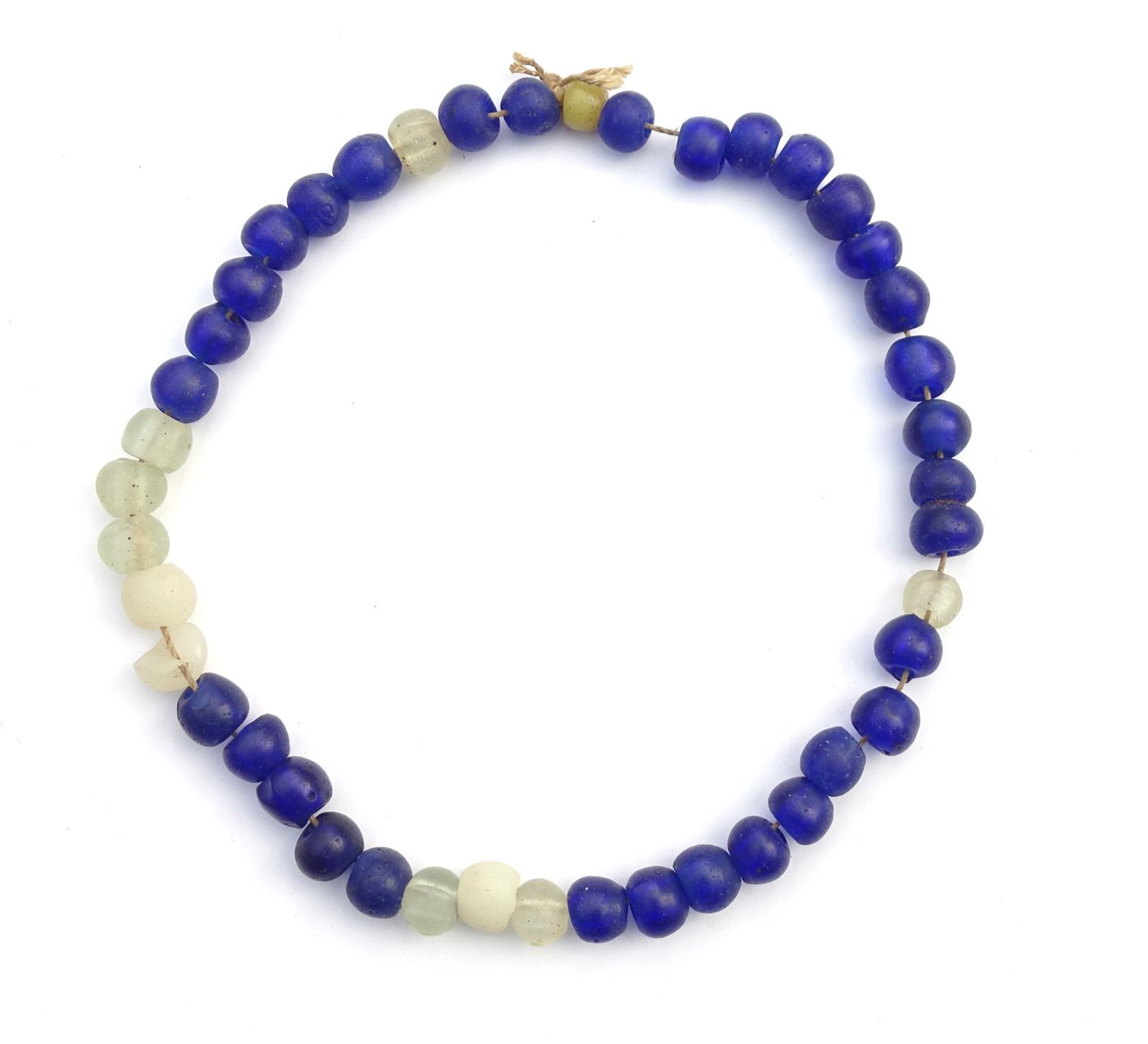 Wound cobalt and clear glass trade bead strand