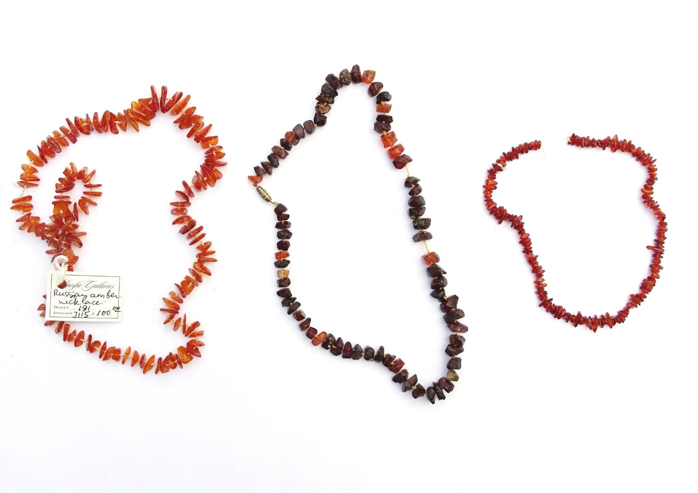 Three vintage amber chip necklaces