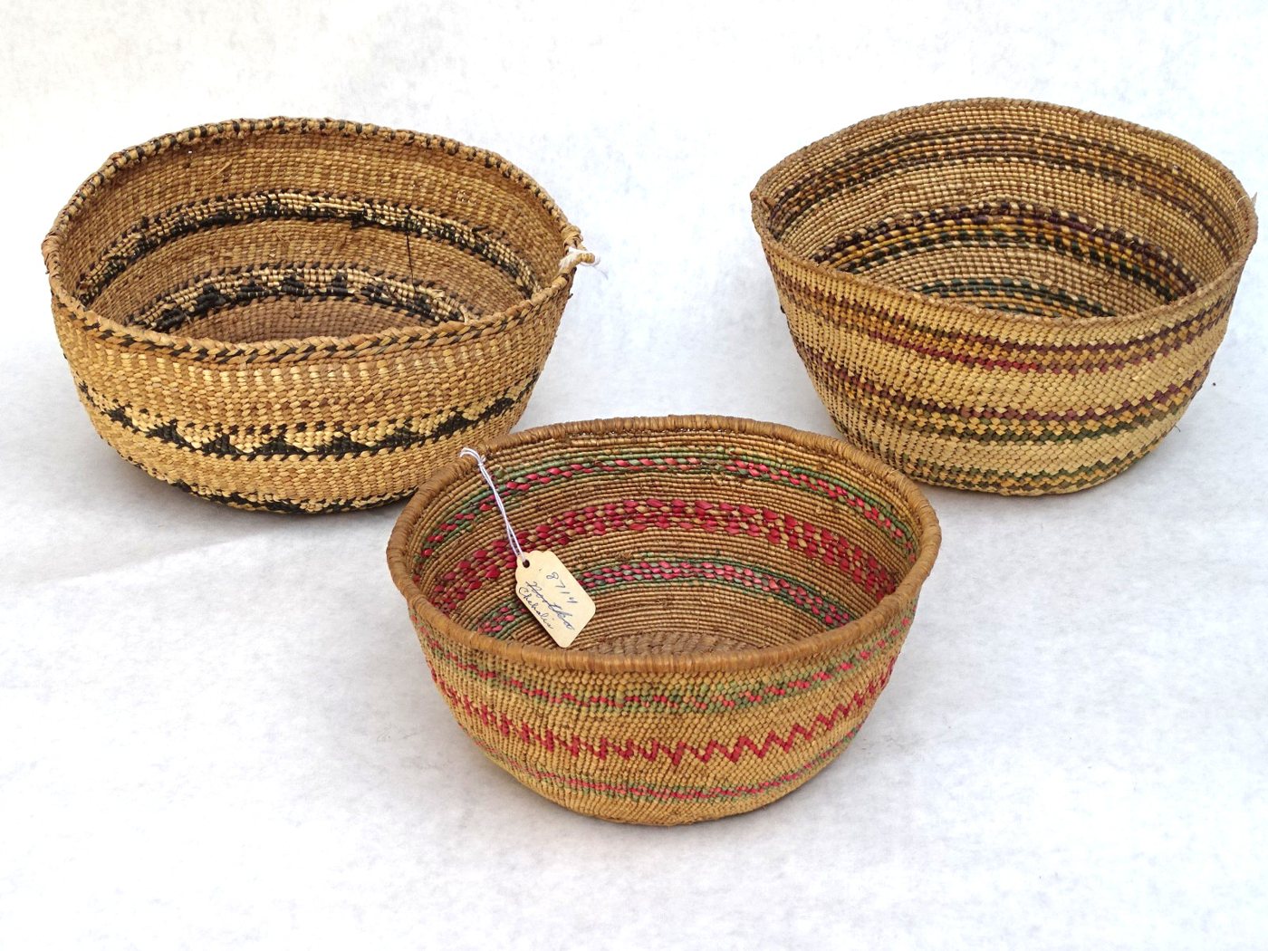 Three Southern Coast Salish twined bowl baskets