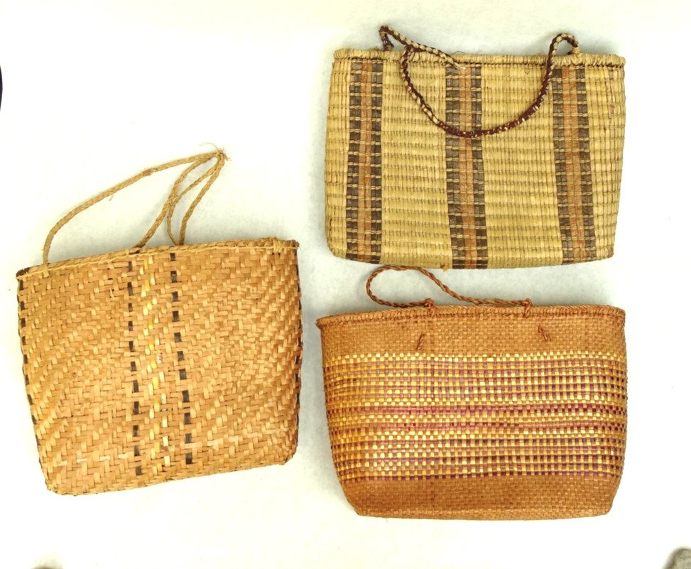 Three Northwest Coast cedar-bark and grass handbags