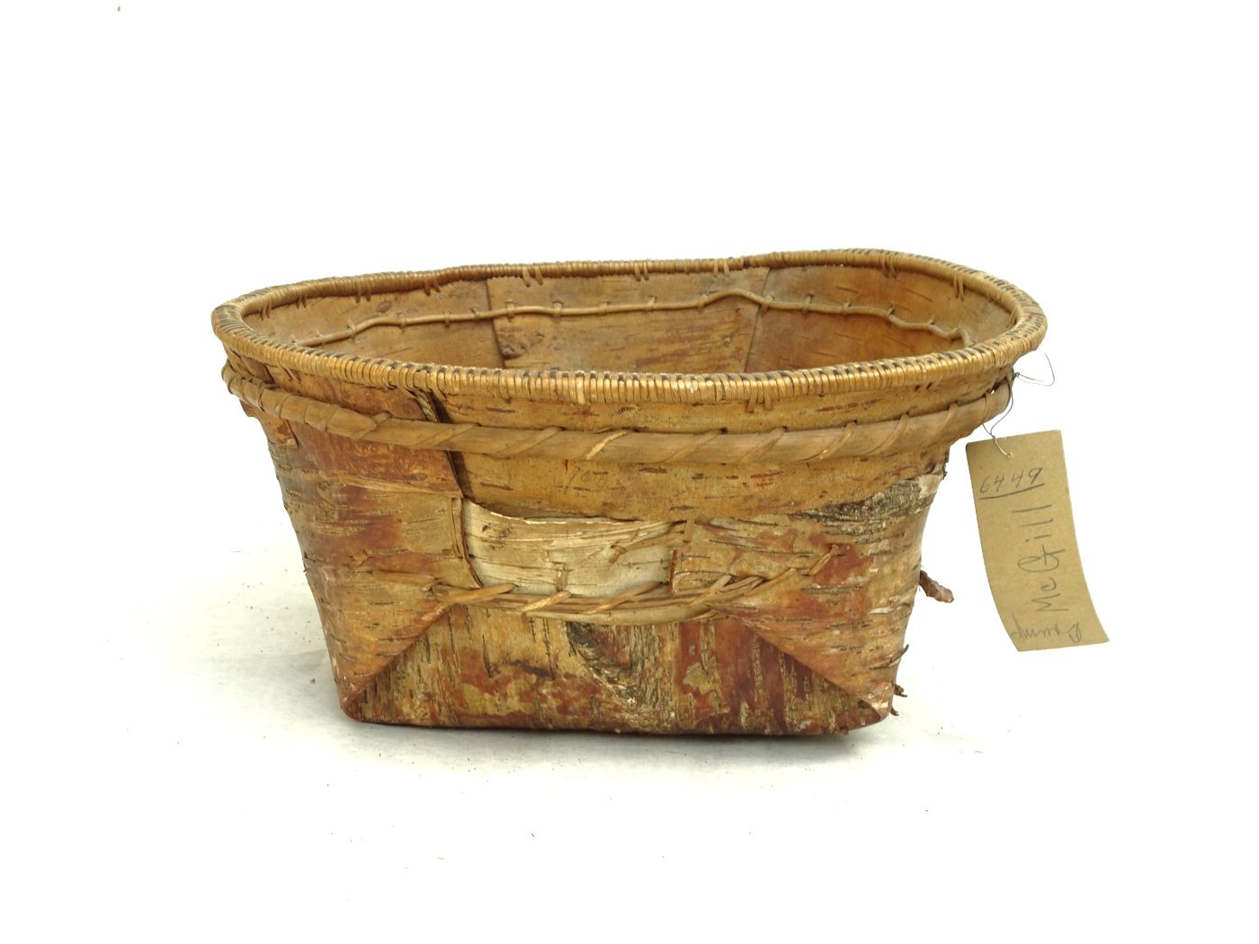 Athabaskan birch-bark basket with fern-patterned rim