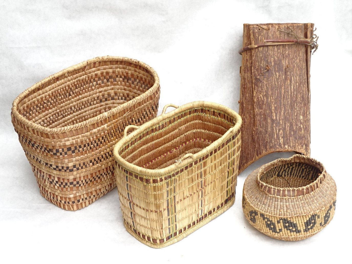 Four Northwest Coast baskets incl. two tagged Quileute