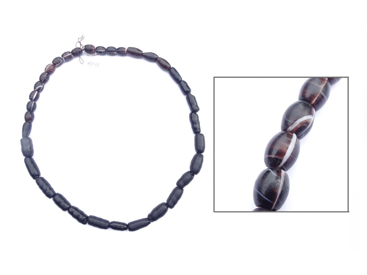 Black and brown wound glass trade bead strand