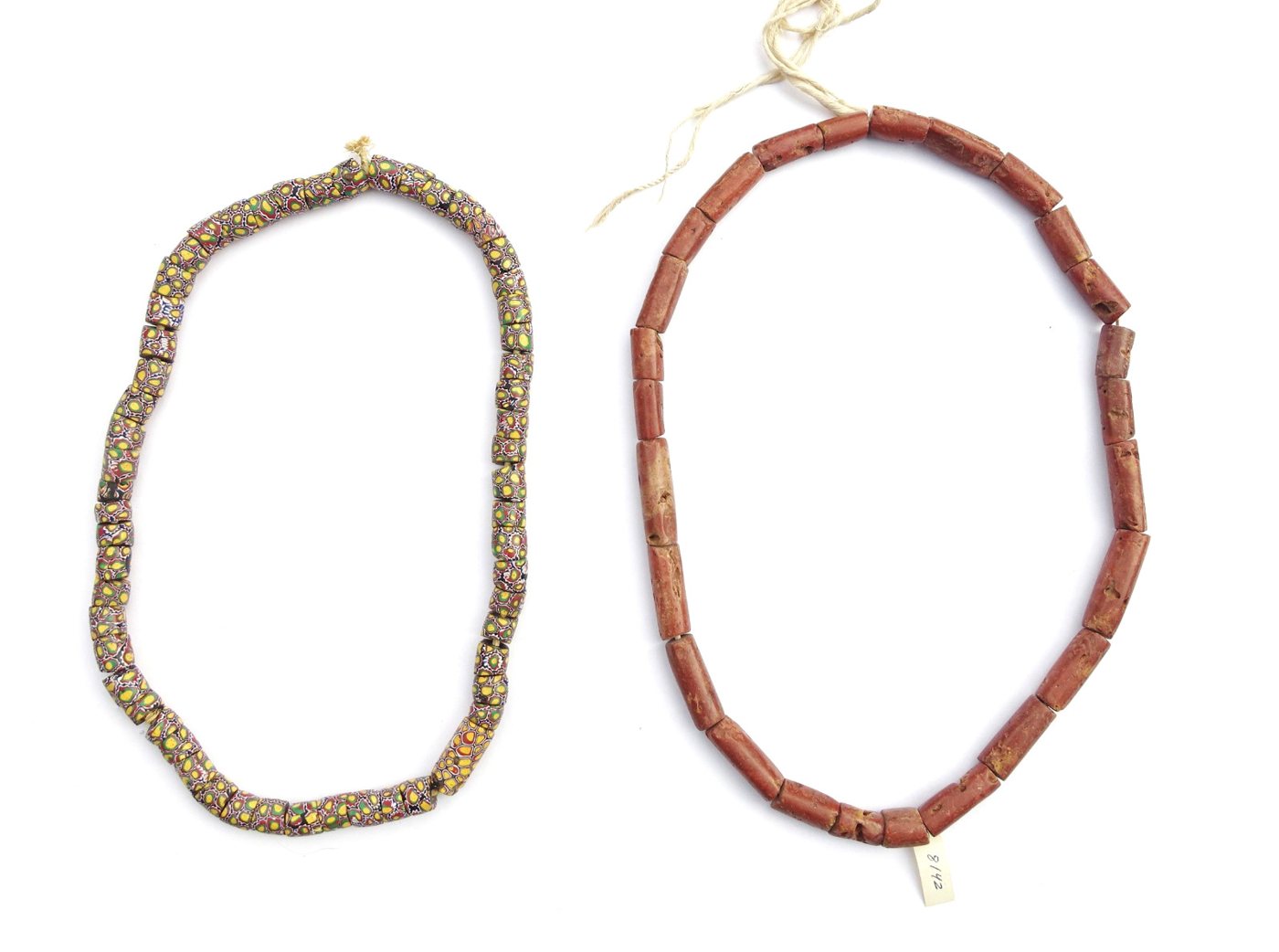 Venetian millefiori strand and red stone tube bead strand